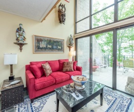 307C - Lakefront One Bedroom Condo with Exotic Flair, Fireplace, & Balcony!